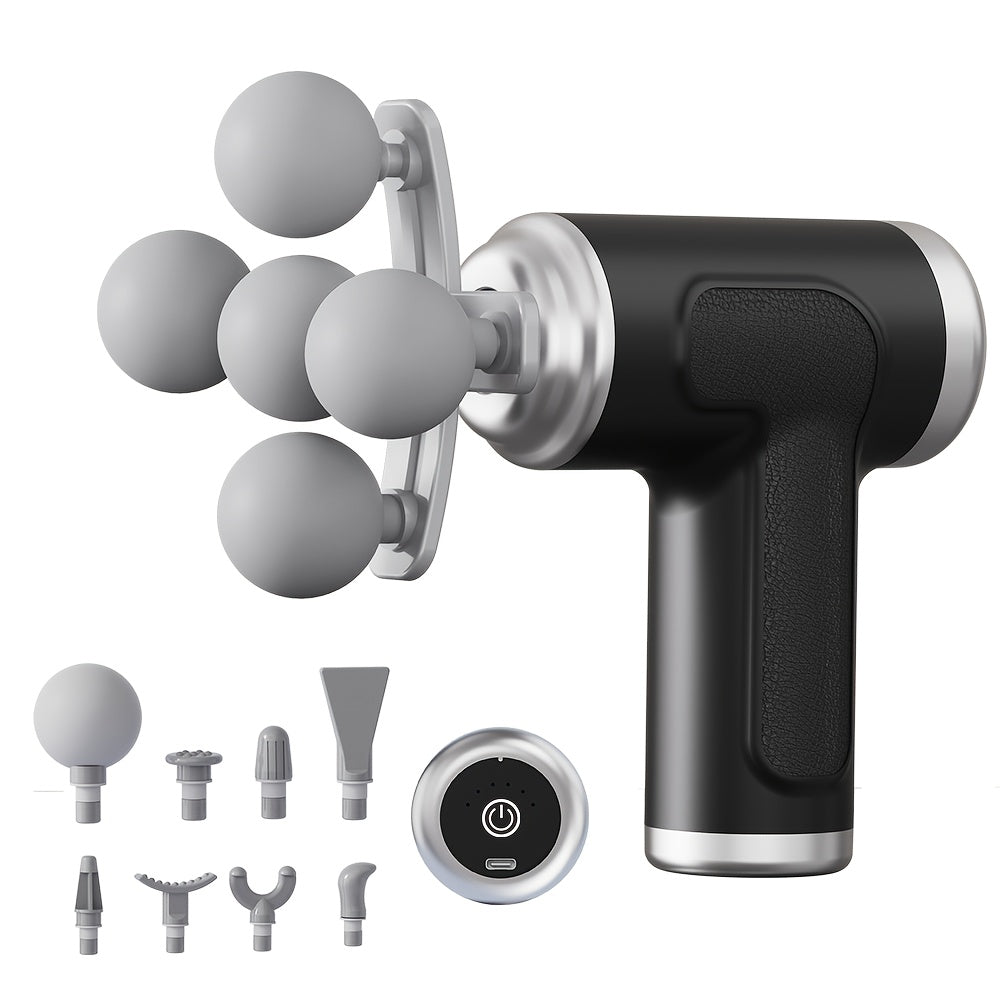 Black handheld massage gun with various attachments on a white background